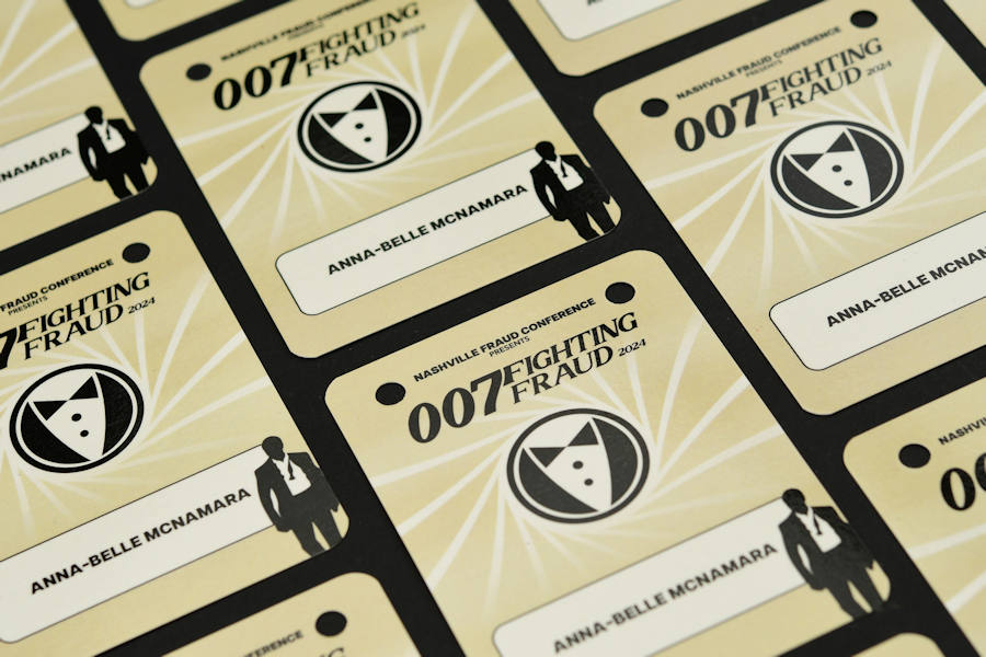 Biodegradable conference badges made from recycled card stock