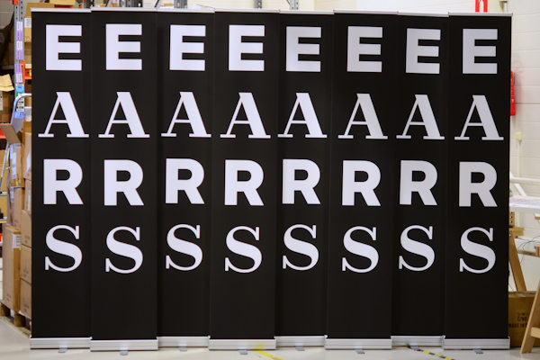 Roll-up advertising banner stand